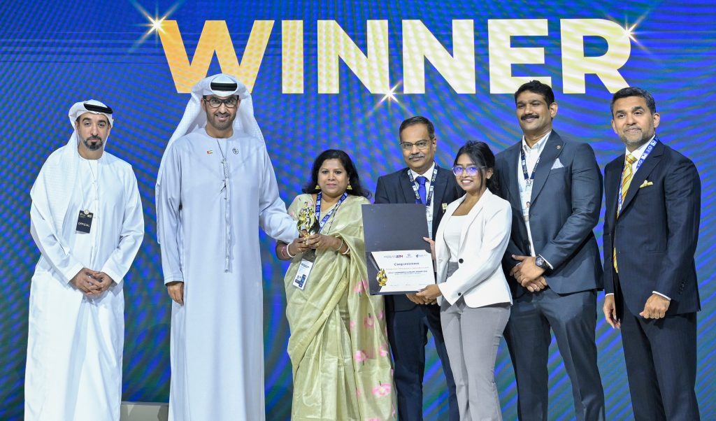 HE Dr. Sultan Al Jaber presents the award to Hindustan Petroleum Corporation Limited, which won the Highly Commended category.